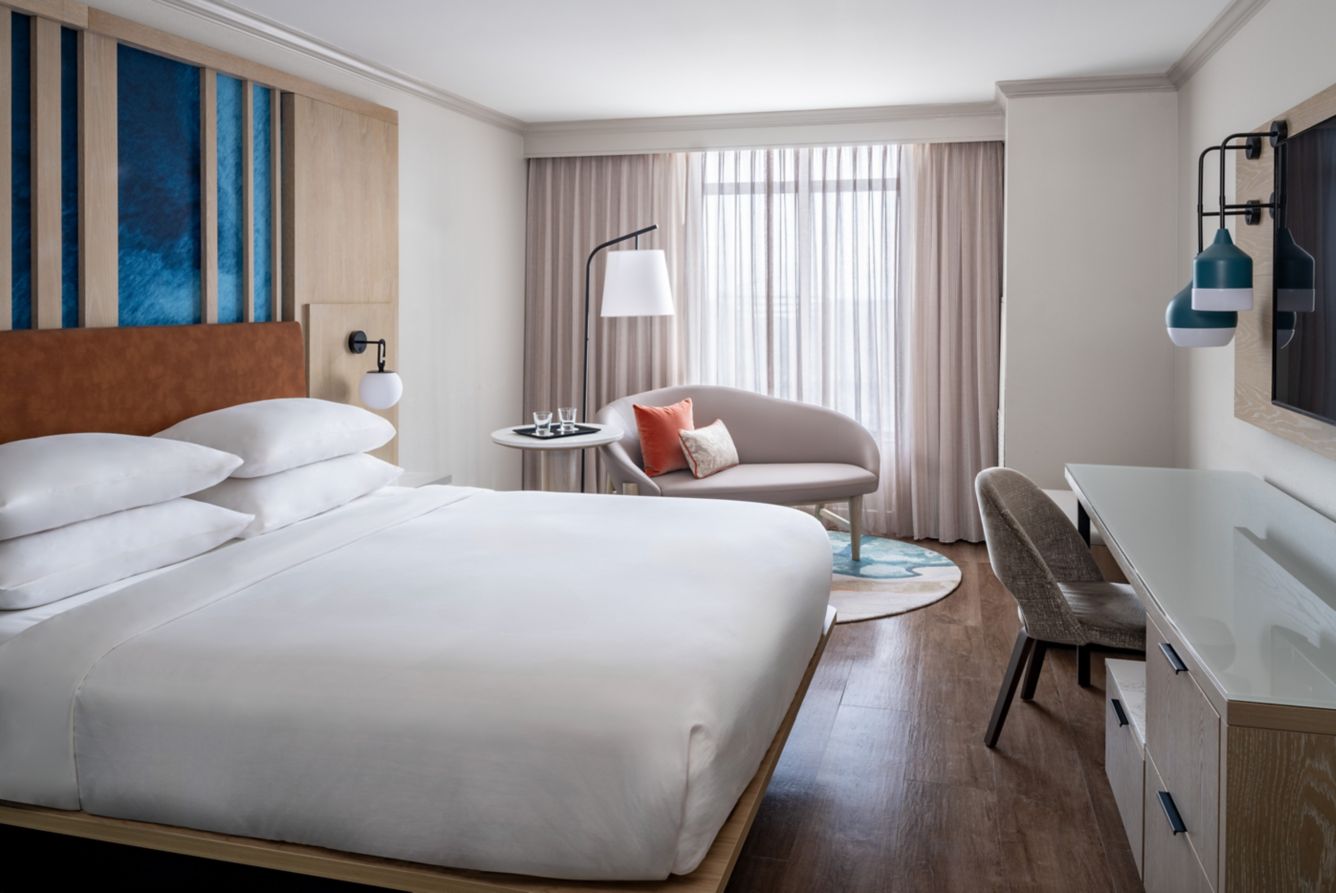 Comfortable king guest room with waterfront view